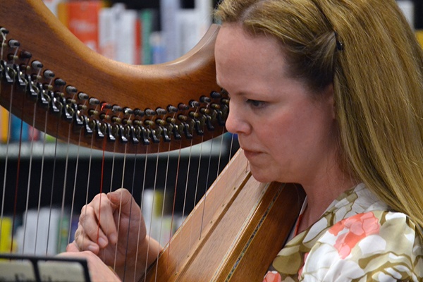 Adult harp student