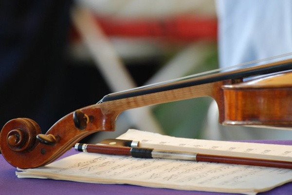 violin resting on music