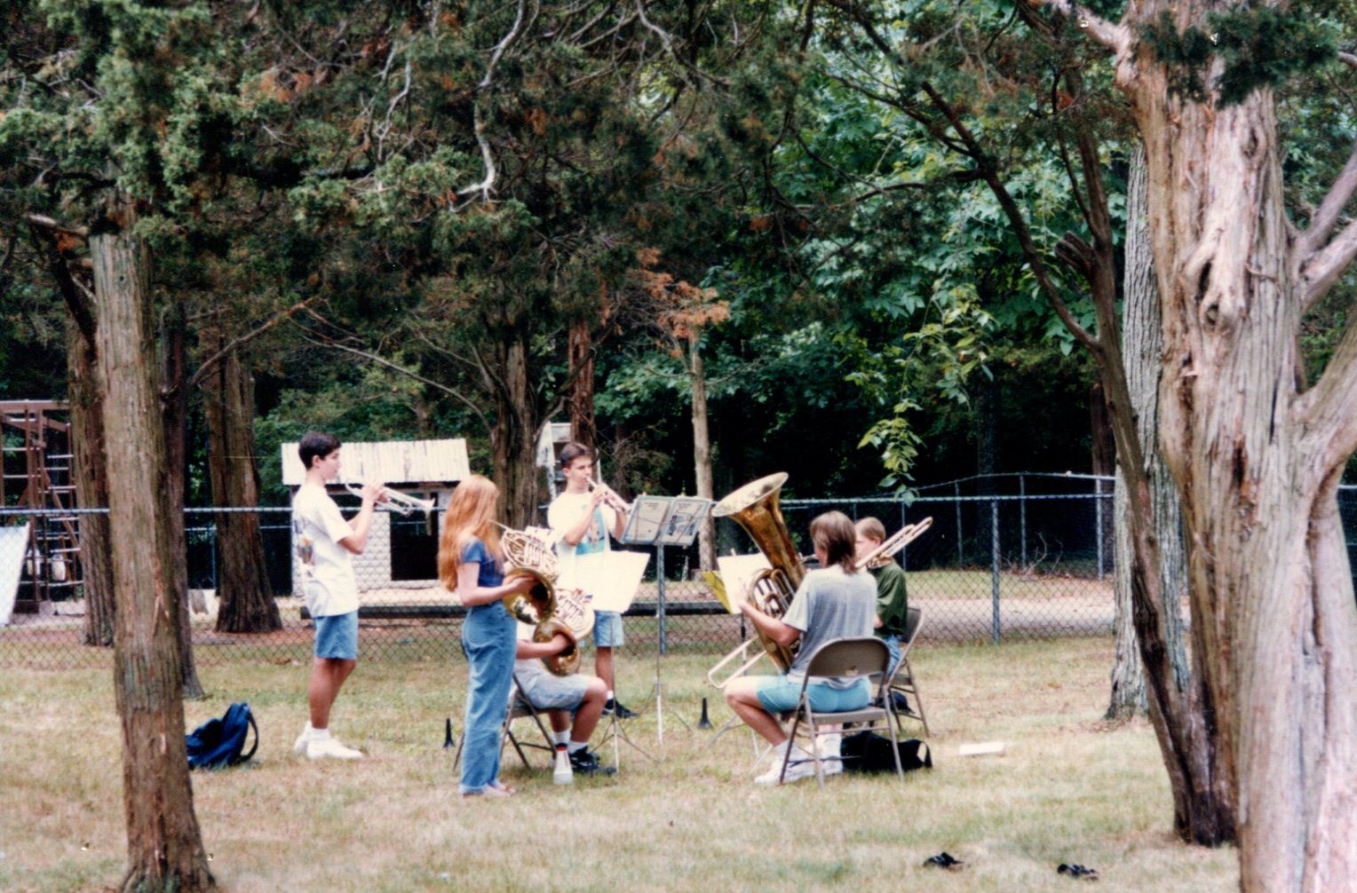 Vintage SSC photo of SWE chamber group playing outside.
