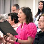 SSC Community Voices participants singing in a performance