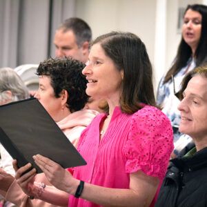 SSC Community Voices participants singing in a performance